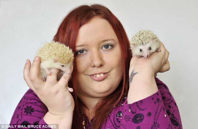 Emma Crossan, 24, with her pet pygmies Swarley, left, who is is three months old and Ella, right, who is six months old